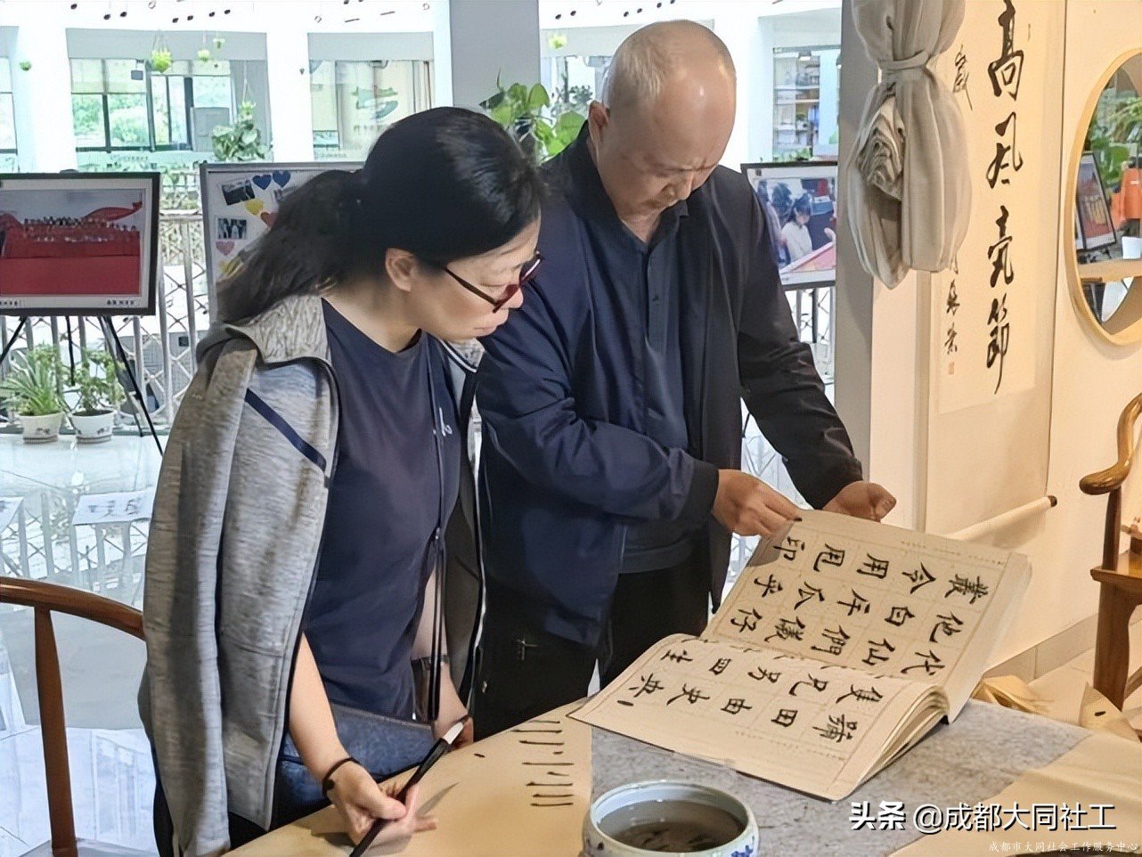 “笔墨留香·韵味悠长”——府河新居社区书法讲评交流活动